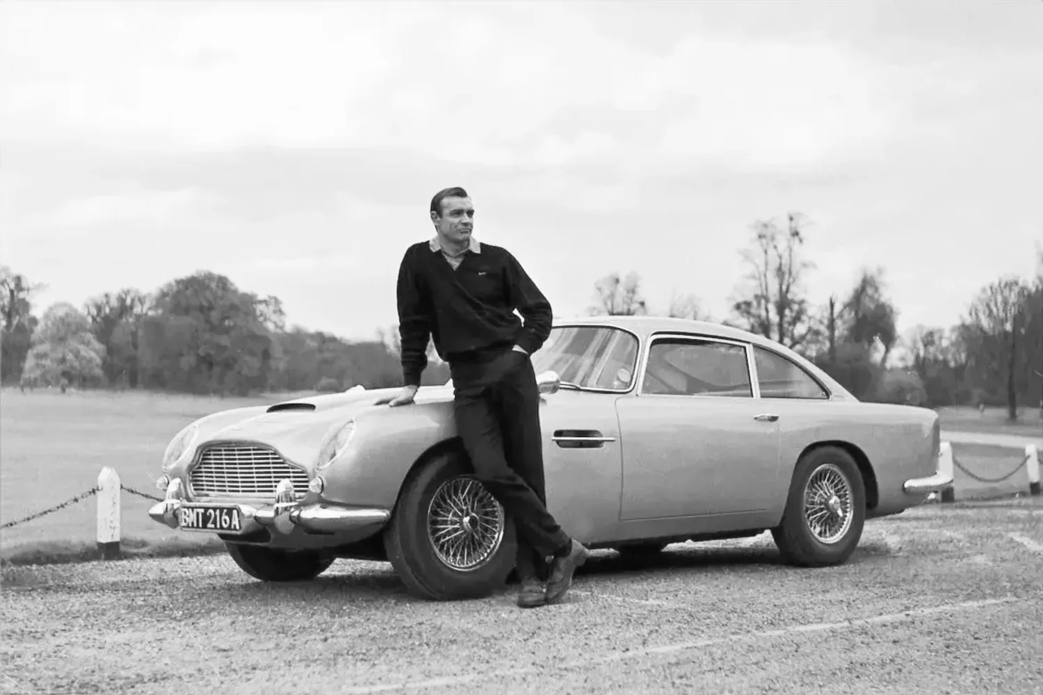 Sean Connery as James Bond 007 with Aston Martin DB5 Goldfinger
